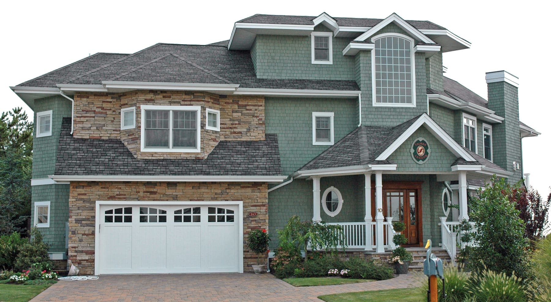Two-story home with architectural asphalt shingle roofing
